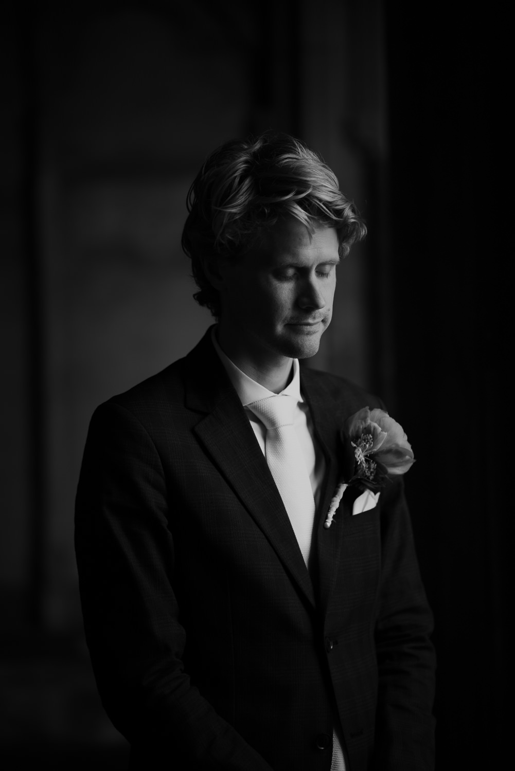 groom portrait in utrecht dom tower by mark hadden wedding photographer