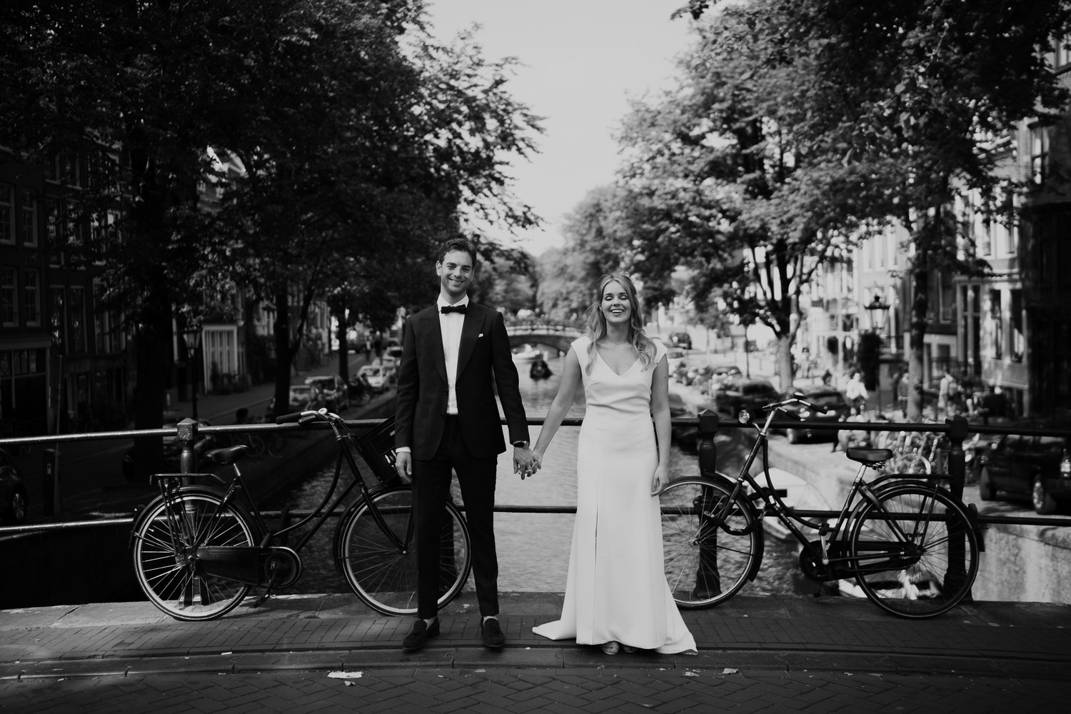 Couple getting Married in Amsterdam photo shoot at canals by mark hadden wedding photographer