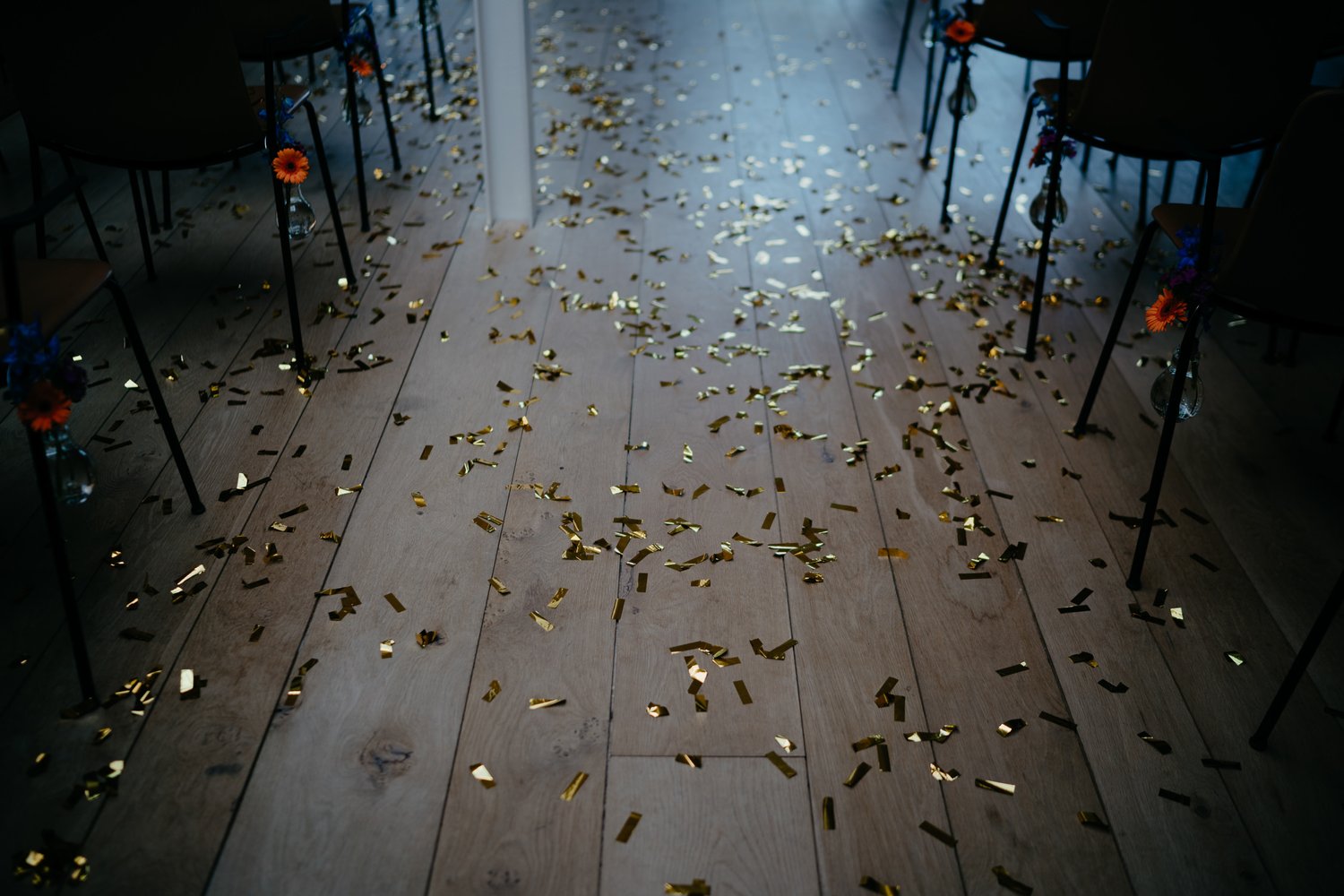 confetti on the floor after a wedding ceremony in amsterdam by wedding photographer mark hadden
