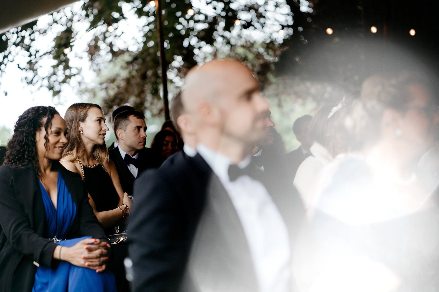 Michelle Jethro-101 - elegant guests attending outdoor wedding ceremony in amsterdam.jpg