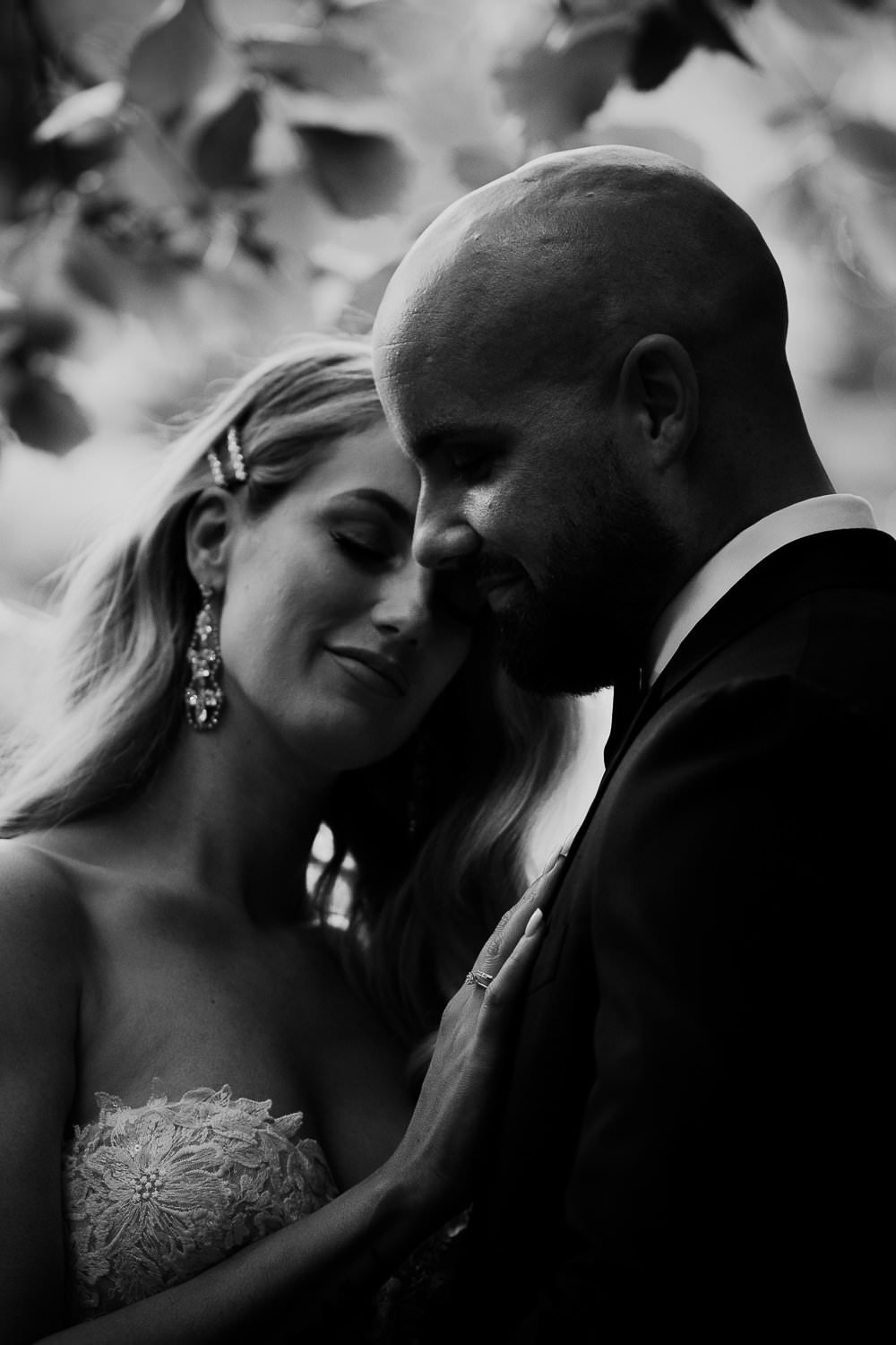 Michelle Jethro-197-4 - bride and groom embracing during wedding celebration in amsterdam.jpg