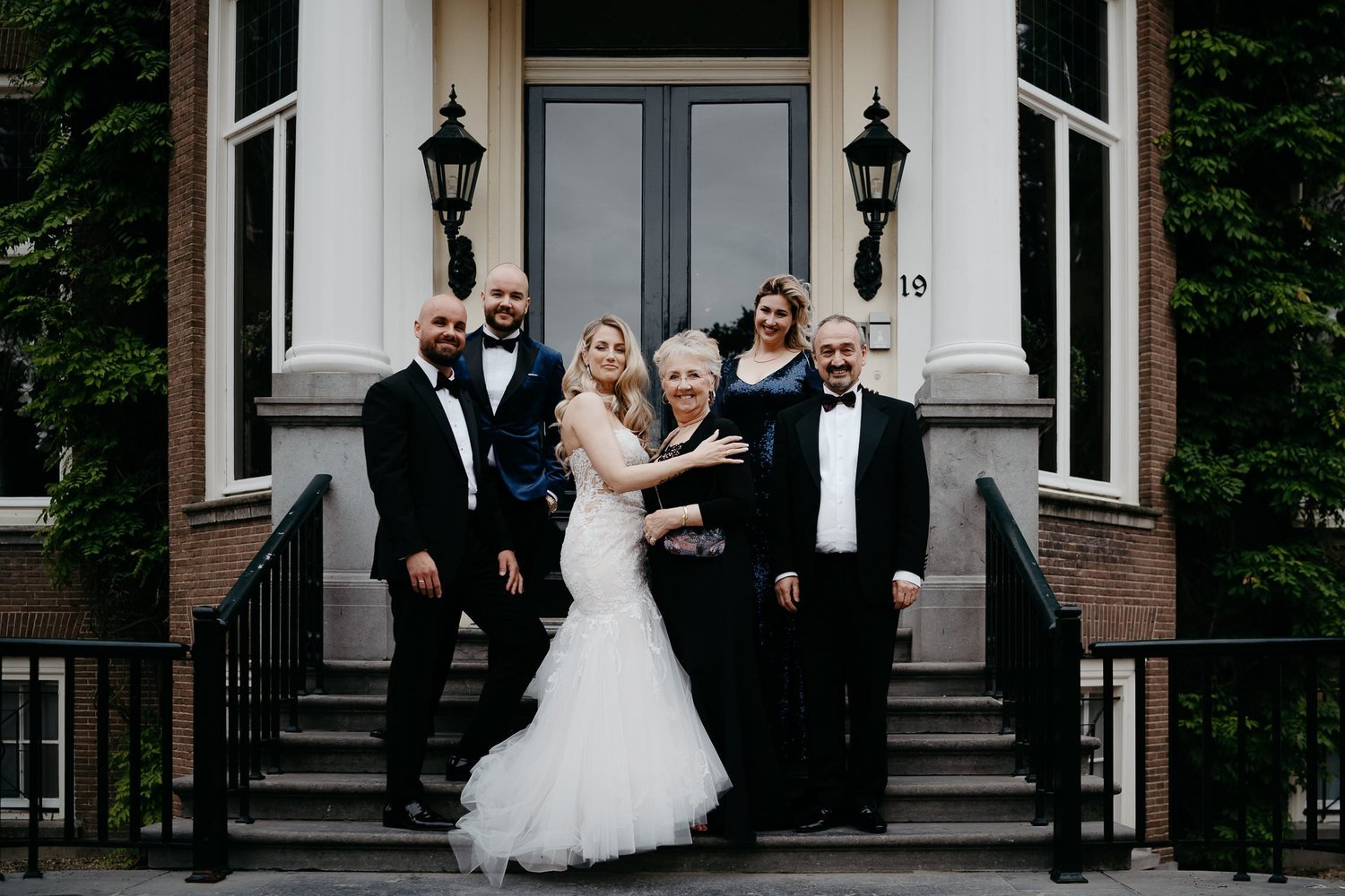 Michelle Jethro-259 - family posing for a wedding photographer in amsterdam.jpg
