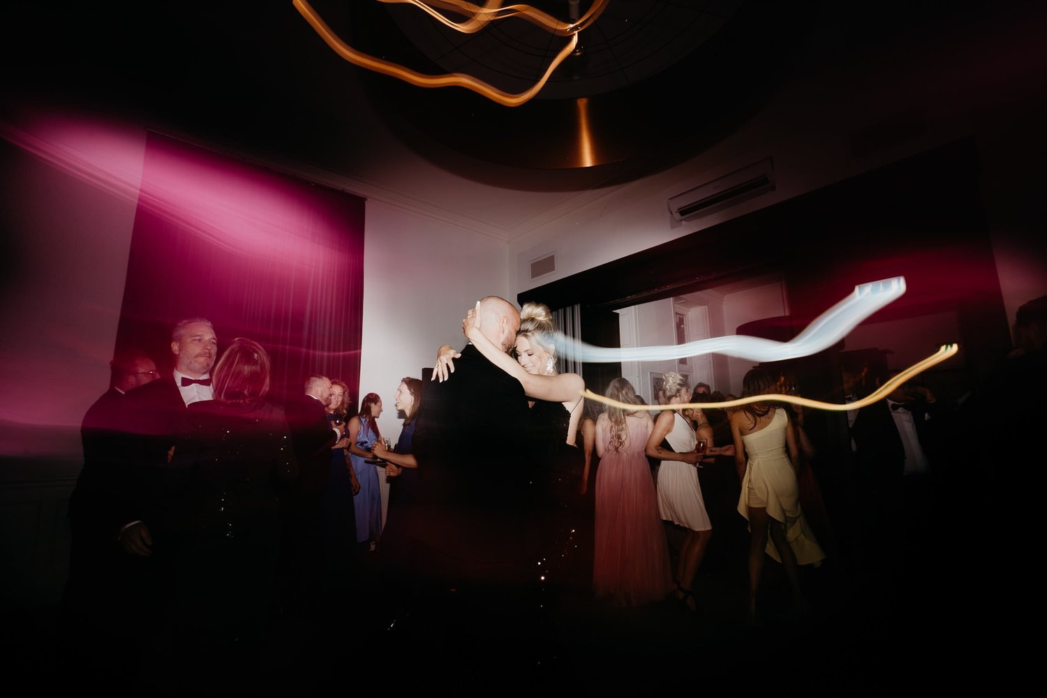 Michelle Jethro-302 - bride and groom embracing on dance floor at wedding reception in amsterdam.jpg