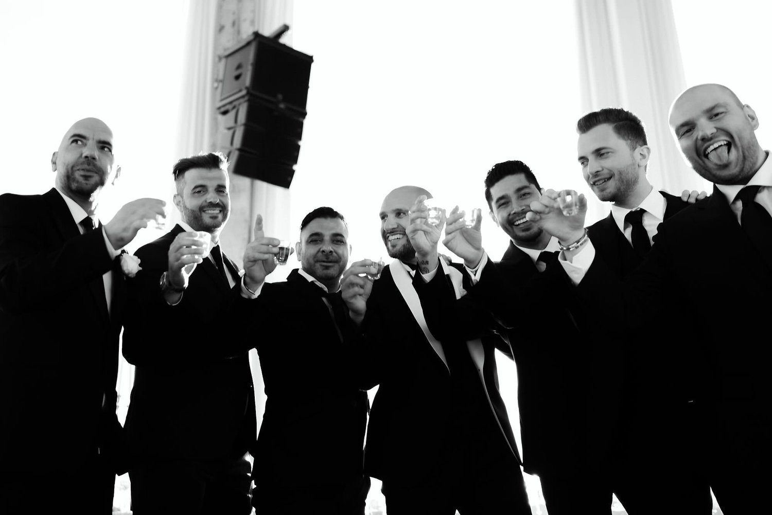 Kareline_Amir_265_2 - Groomsmen toasting at wedding reception in amsterdam a'dam tower.jpg