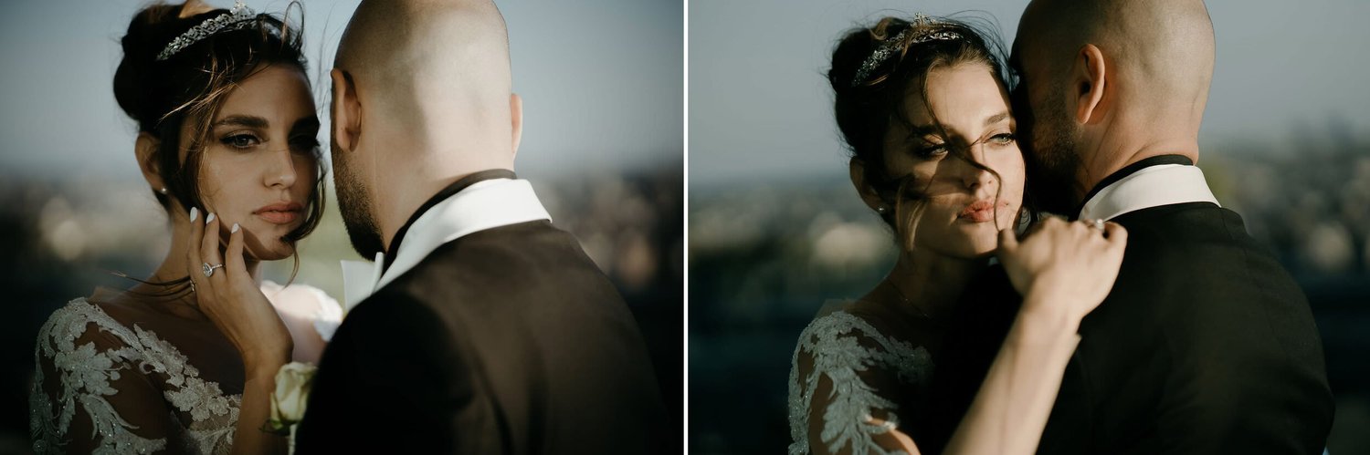 Kareline_Amir_321copy - Bride and groom embracing during photoshoot in amsterdam loft with a'dam tower view.jpg