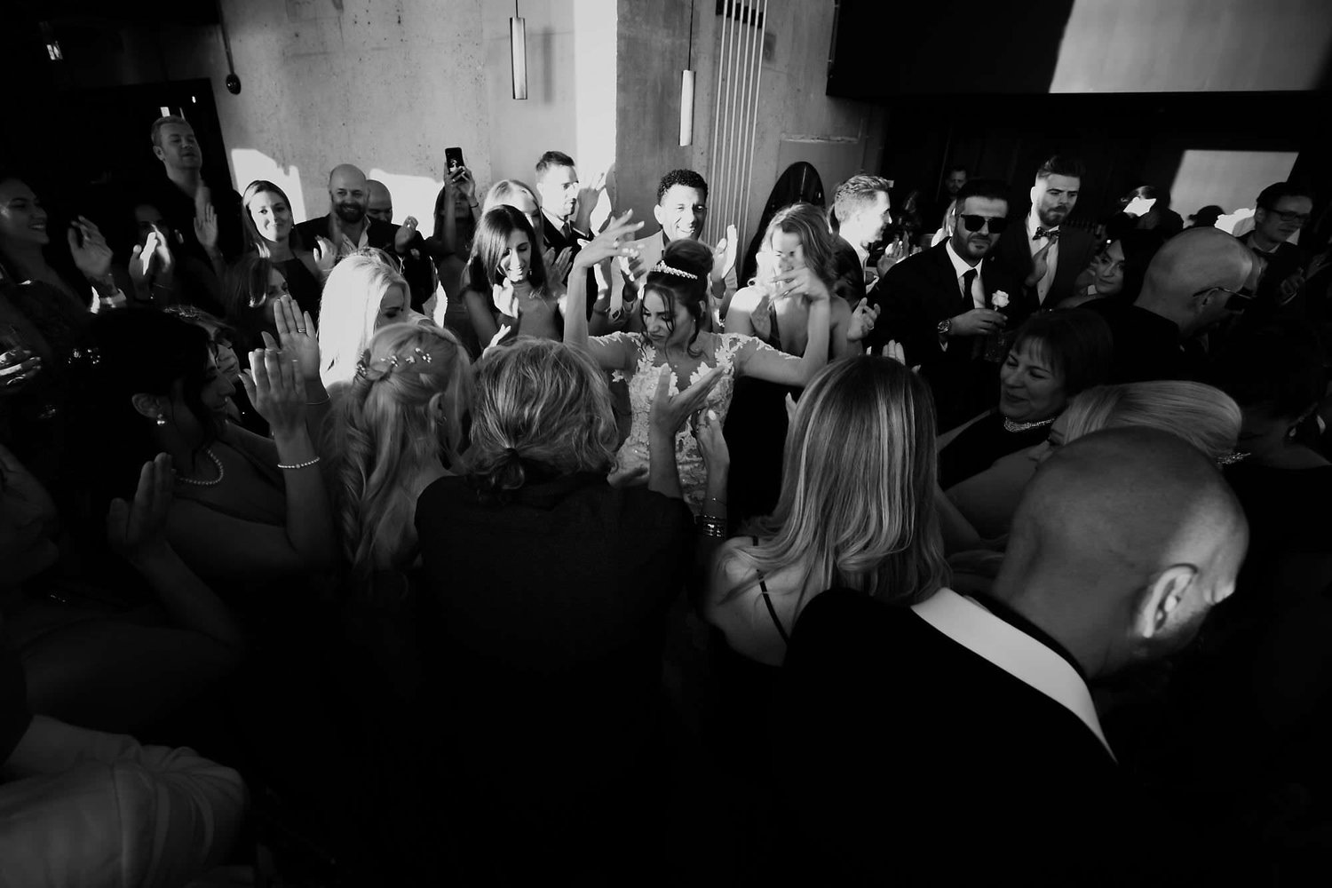 Kareline_Amir_379_2 - Bride dancing and celebrating with guests at wedding reception in amsterdam.jpg