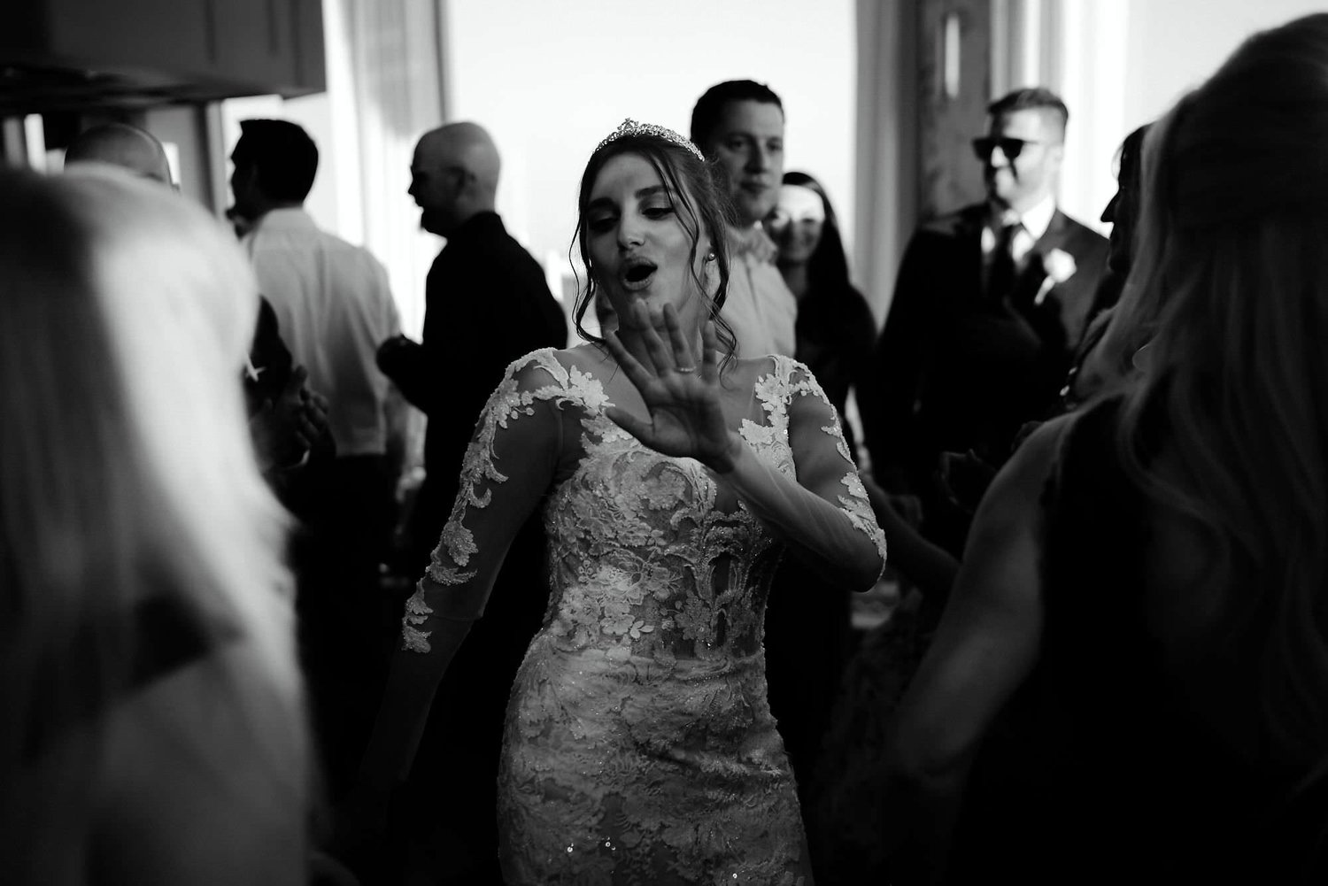 Kareline_Amir_383_2 - Bride dancing and raising hand at wedding reception in amsterdam's a'dam tower.jpg