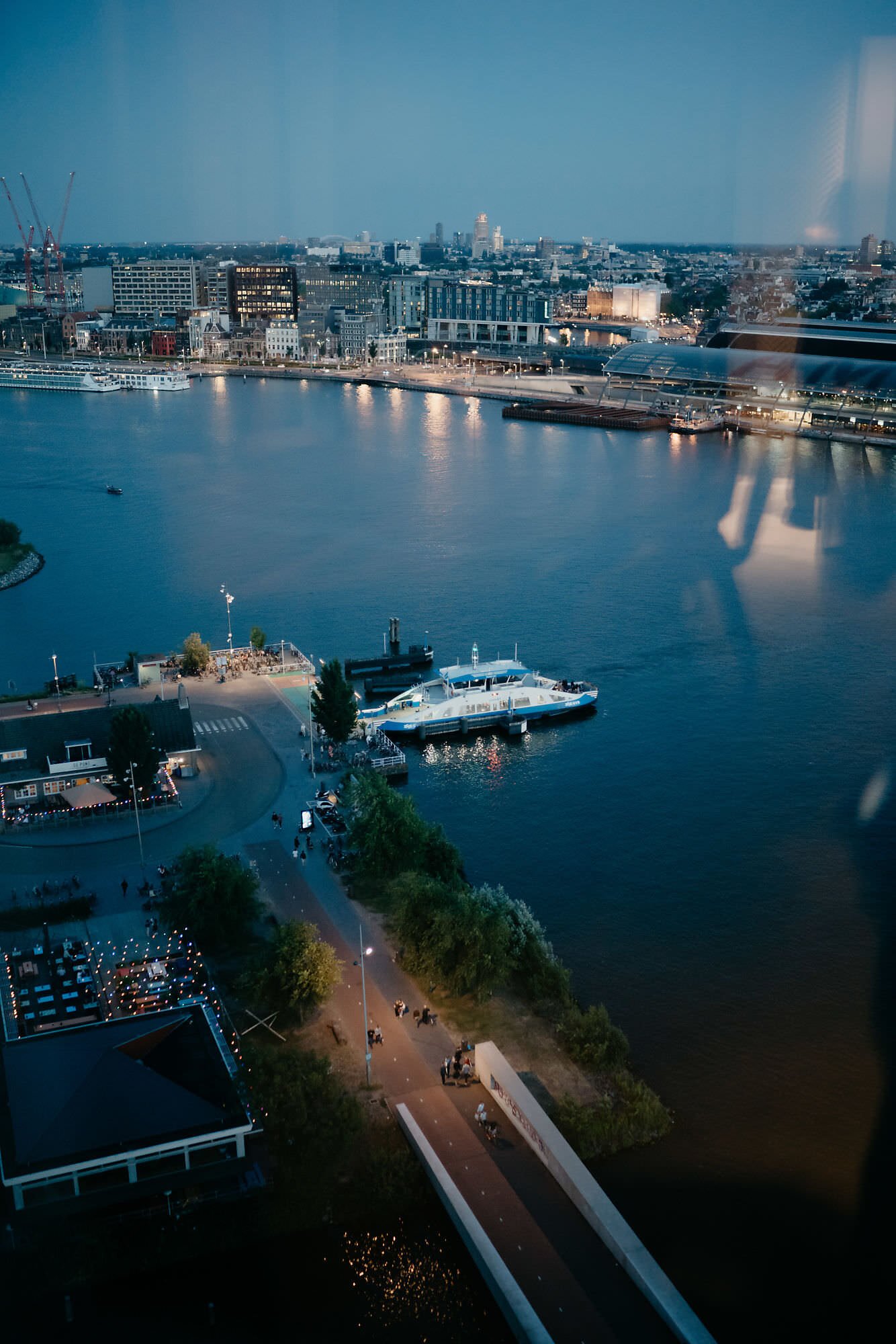 Kareline_Amir_429 - Ferry docking in amsterdam at dusk with a'dam tower in background.jpg