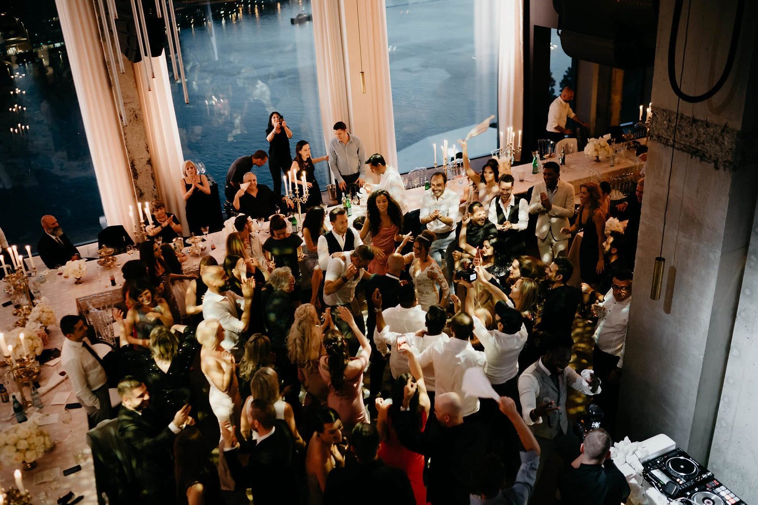 Kareline_Amir_436_2 - Guests dancing at wedding reception in a'dam tower, amsterdam.jpg