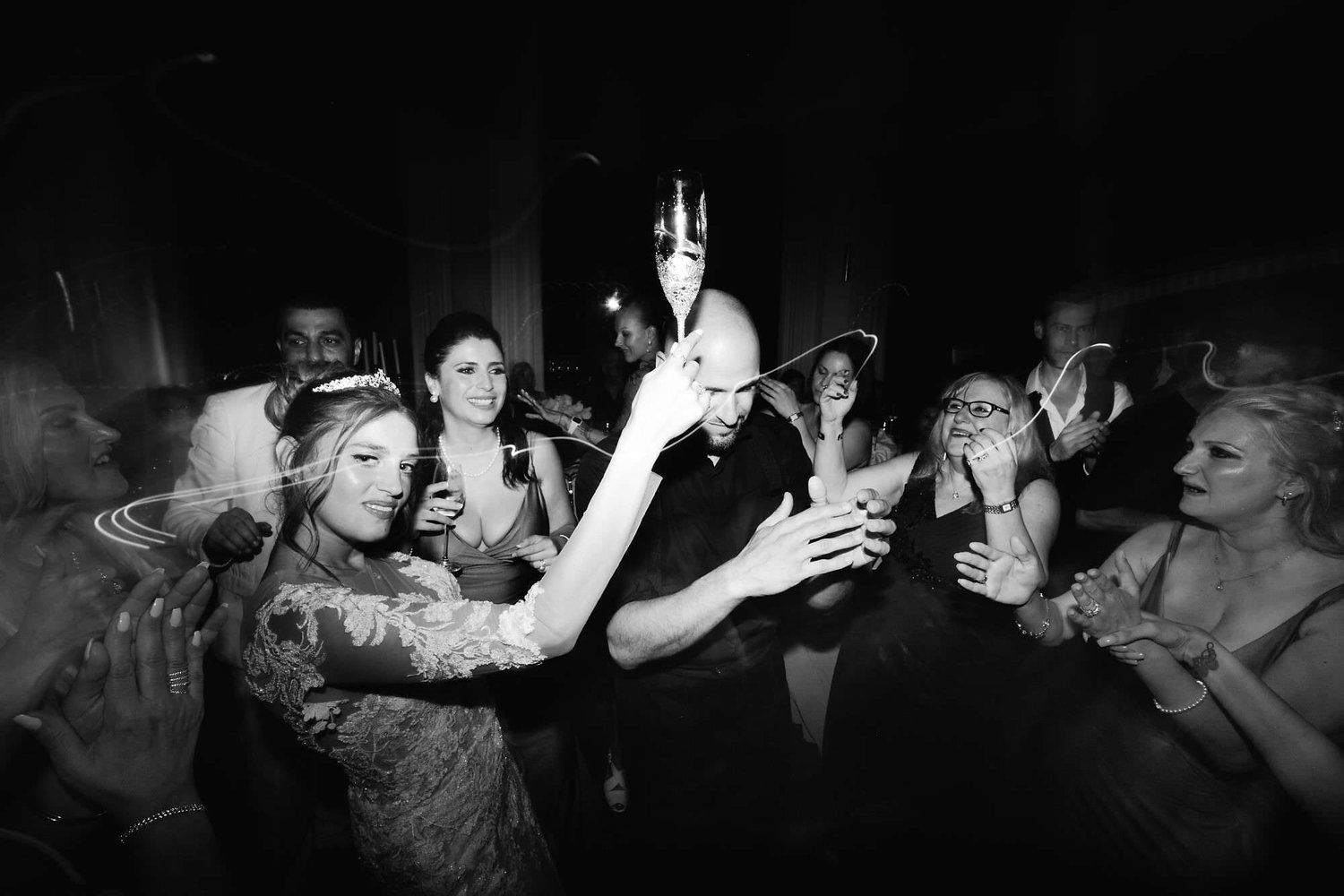Kareline_Amir_478_2 - Bride and groom dancing and celebrating with guests at wedding reception.jpg