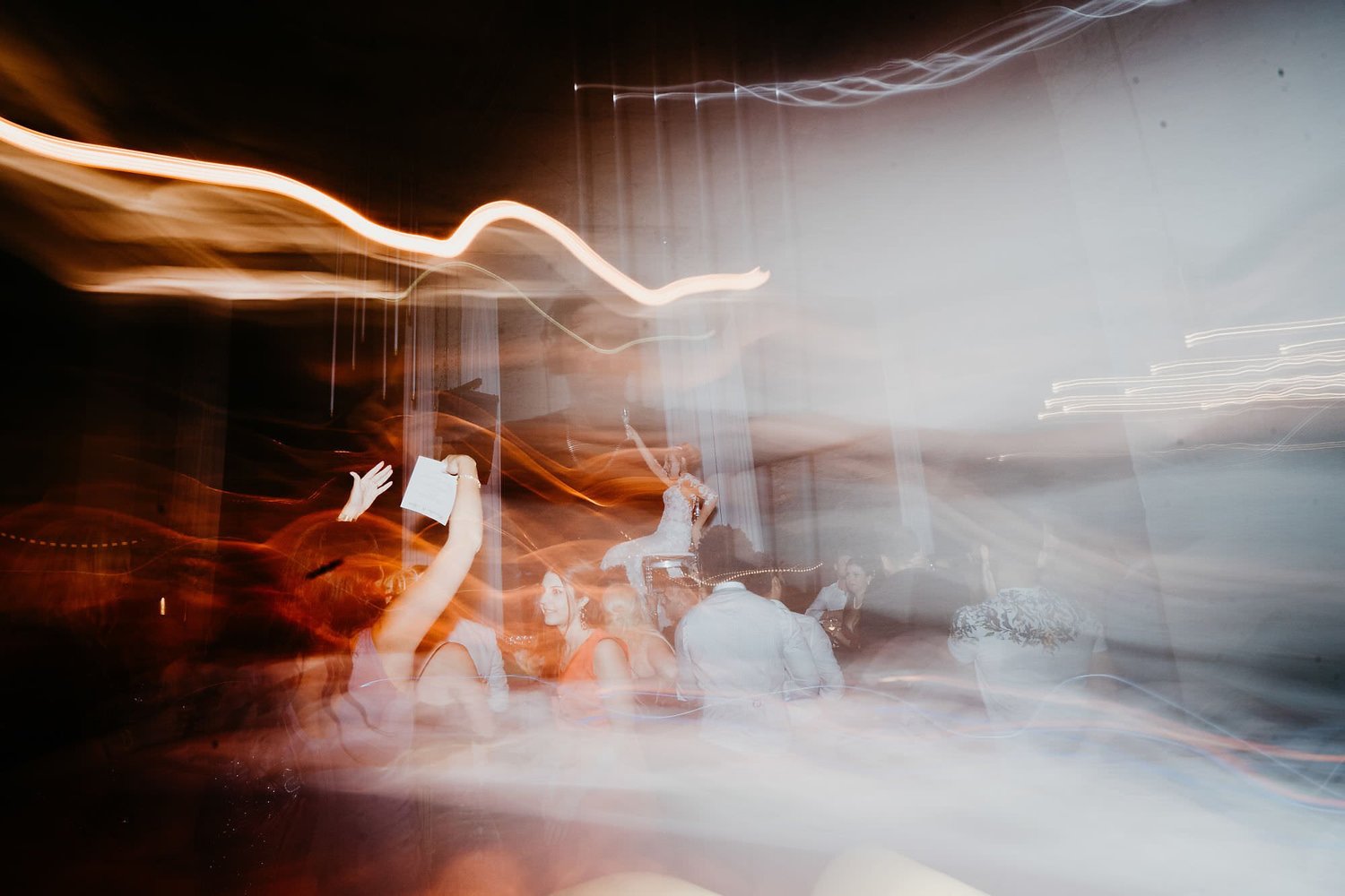 Kareline_Amir_472 - Guests raising hands and dancing at wedding reception in amsterdam's a'dam tower.jpg